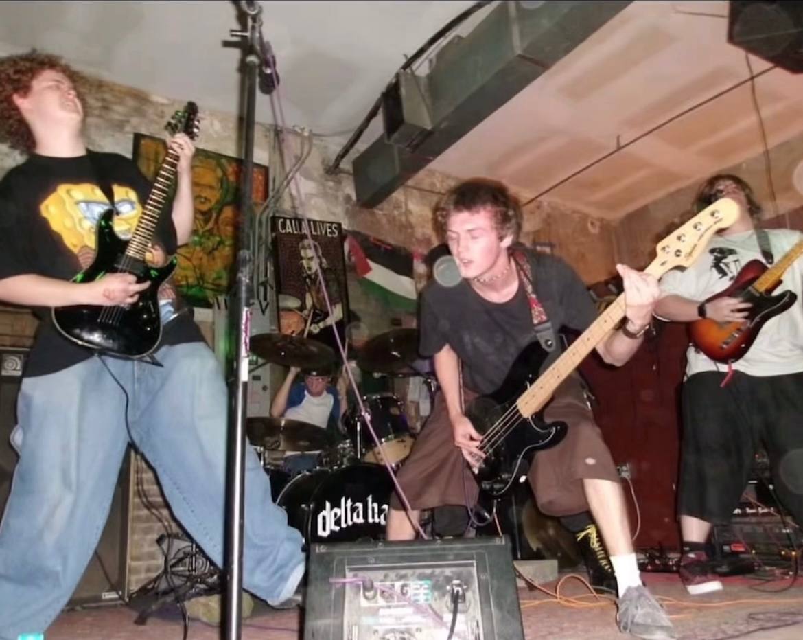 Band playing in a basement venue